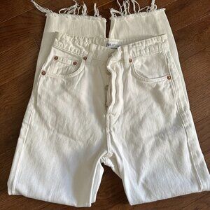 Zara white straight-leg jeans.